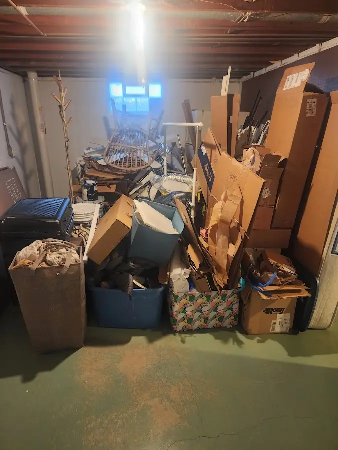 Roll-off dumpster container at job site for 8 Yard Dumpster Rental in Ionia